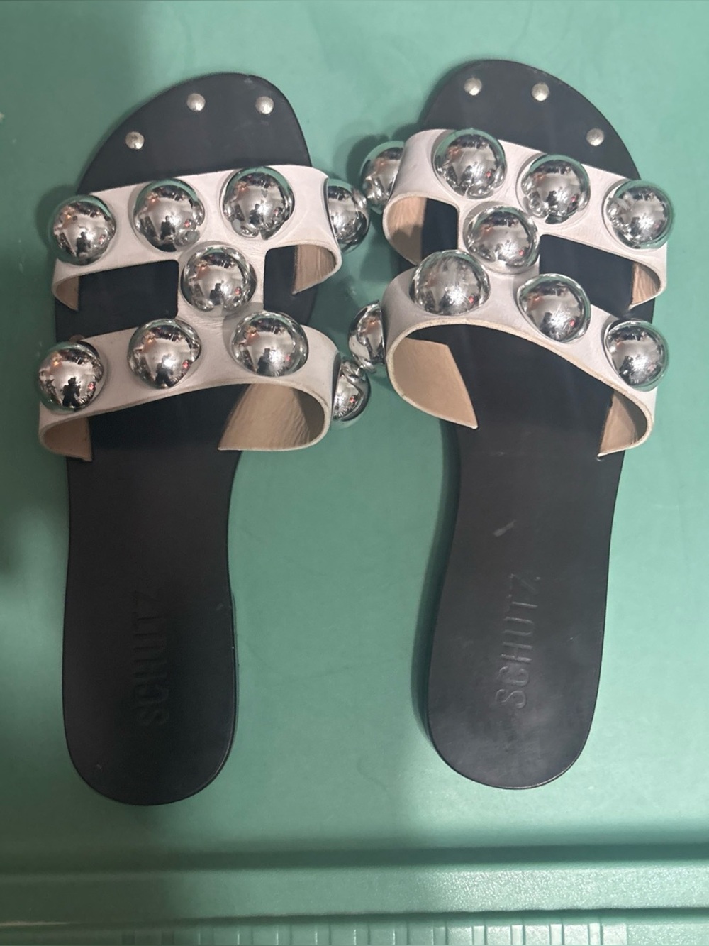 Schutz White Slide Sandals with Silver Studs